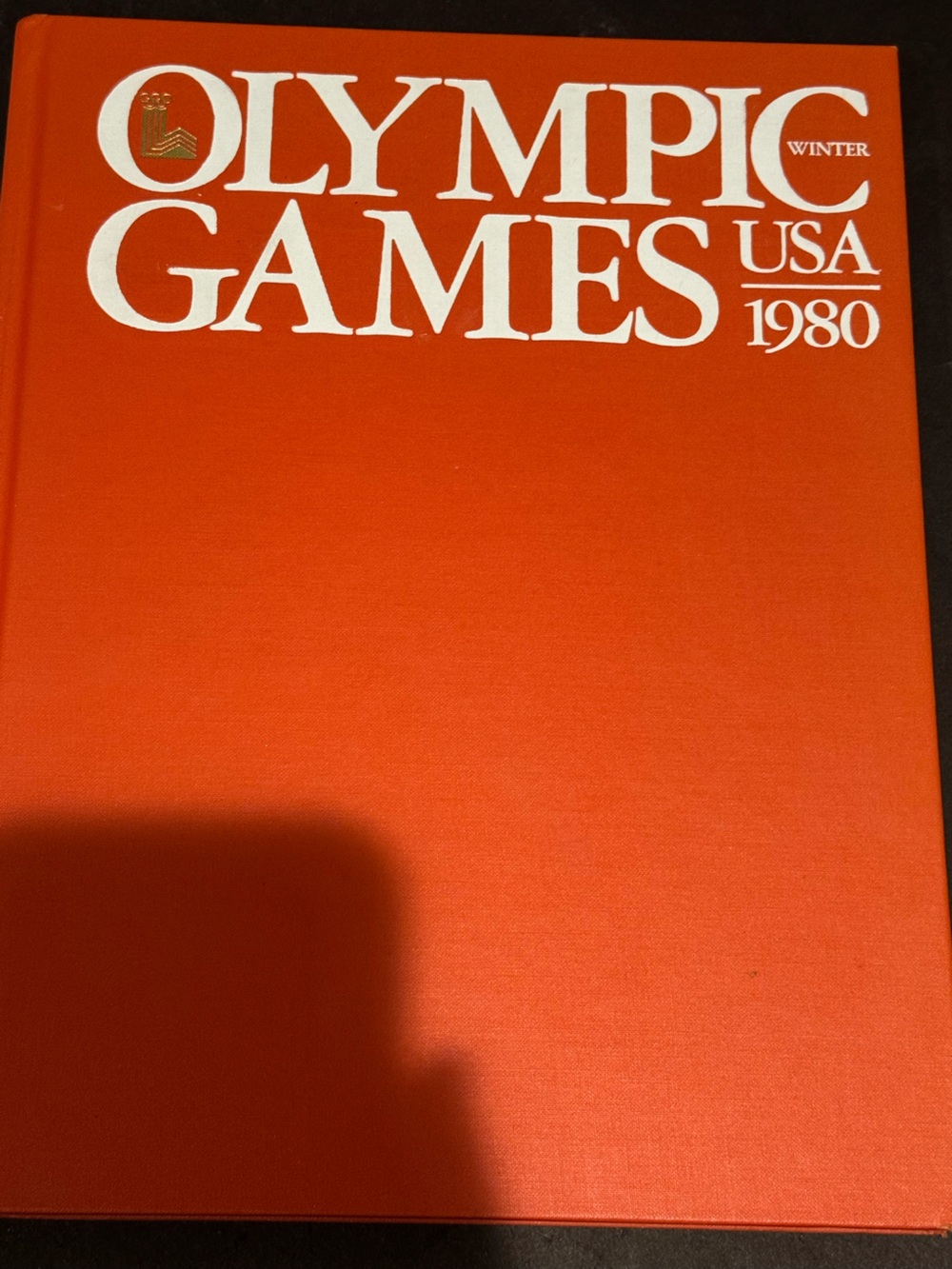 1980 Lake  Placid Olympic book with data  and full page pictures of comeptitors
